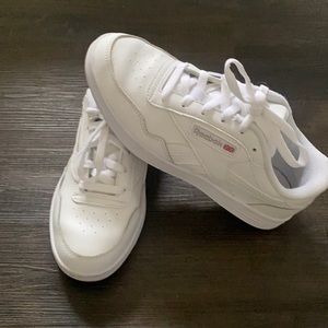White reebox shoes.